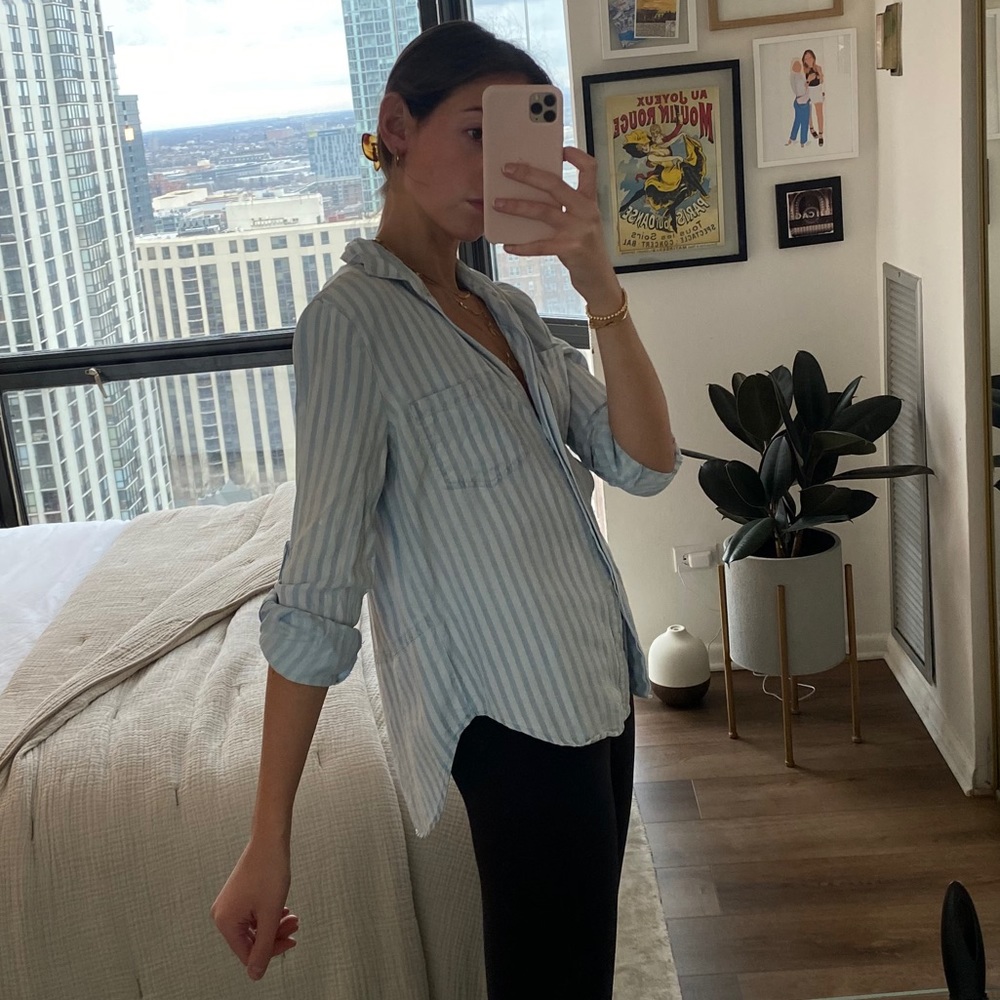Boutique top button down high low split back blous